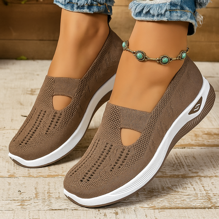 Women's orthopaedic slip-on shoes with advanced arch support for ultimate foot health & comfort.