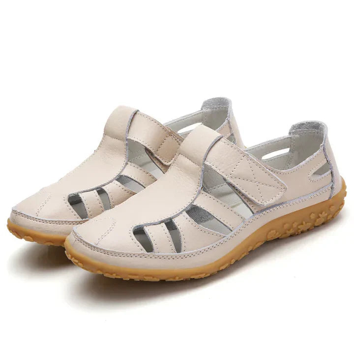 Orthopedic women's sandals offering arch support, comfortable straps, and anti-slip traction for walking.