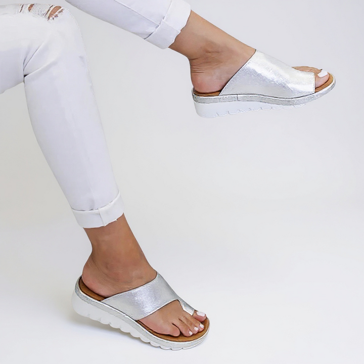 Supportive women's summer footwear: orthopedic bunion relief sandals with arch support for pain-free walking.