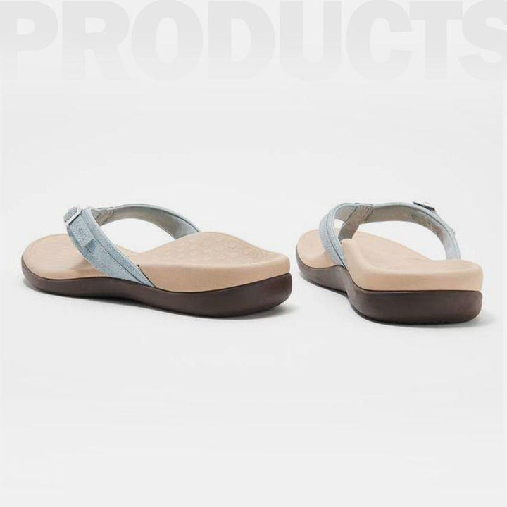 Women's comfort footwear: arch support flip flops in a vibrant color, perfect for active summer days.