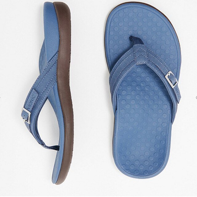 Side view of women's flip flop showing ergonomic sole and elevated arch support for orthopedic benefits.