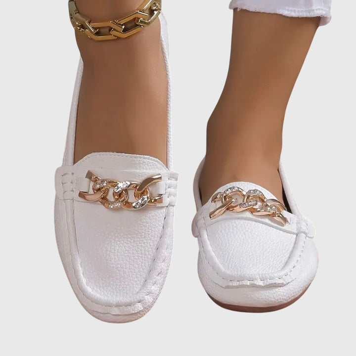 Women's orthopedic loafers in a neutral color, offering all-day comfort, arch support, and timeless style.