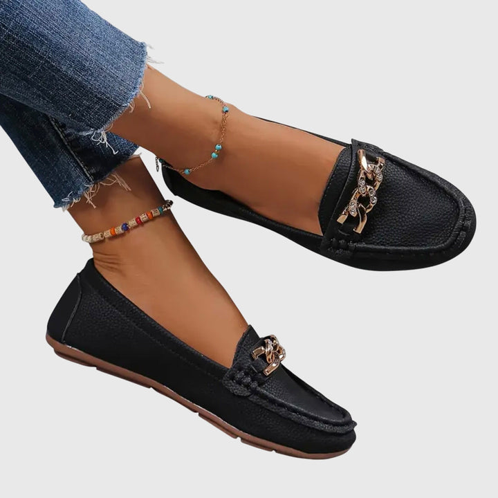 Stylish women's slip-on loafers, designed for easy wear and providing essential foot support and comfort.