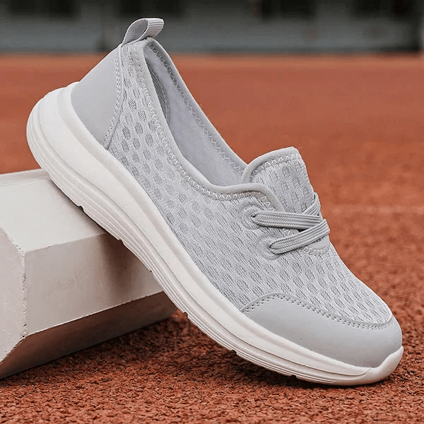 Detail of women's comfort shoes, orthopedic soft sole, mesh construction, arch support