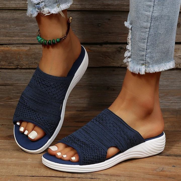 Slip-on women's knit sandals offering flexible fit and orthopedic comfort