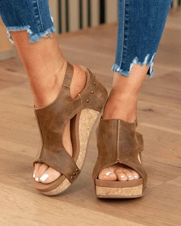 Group of women's orthopedic platform wedge sandals in various colors, emphasizing comfort and style