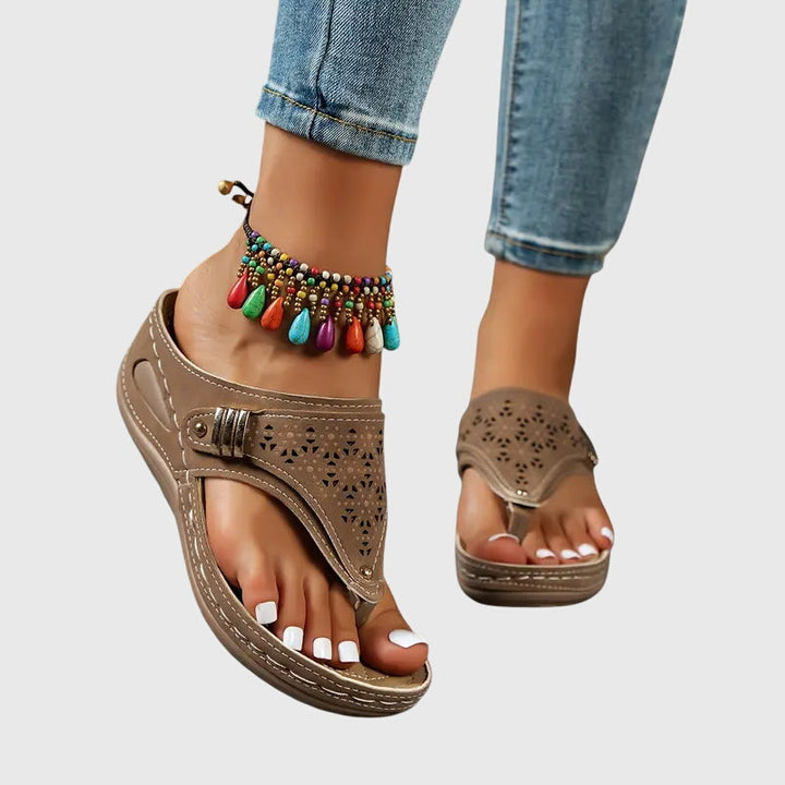 Orthopedic arch support sandals for women, designed for foot pain relief & walking comfort.