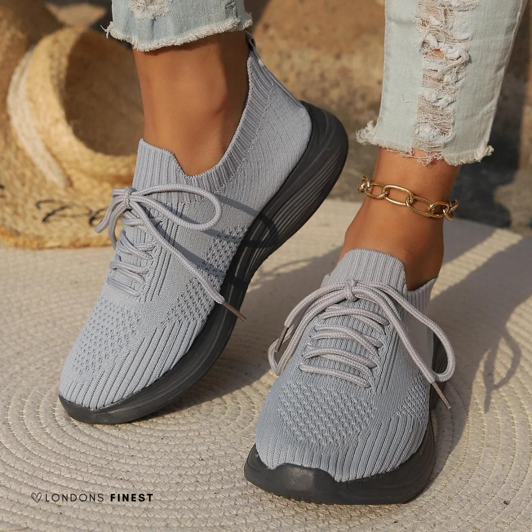 Comfortable women's supportive sneakers, perfect for daily wear & walking, featuring ergonomic design.