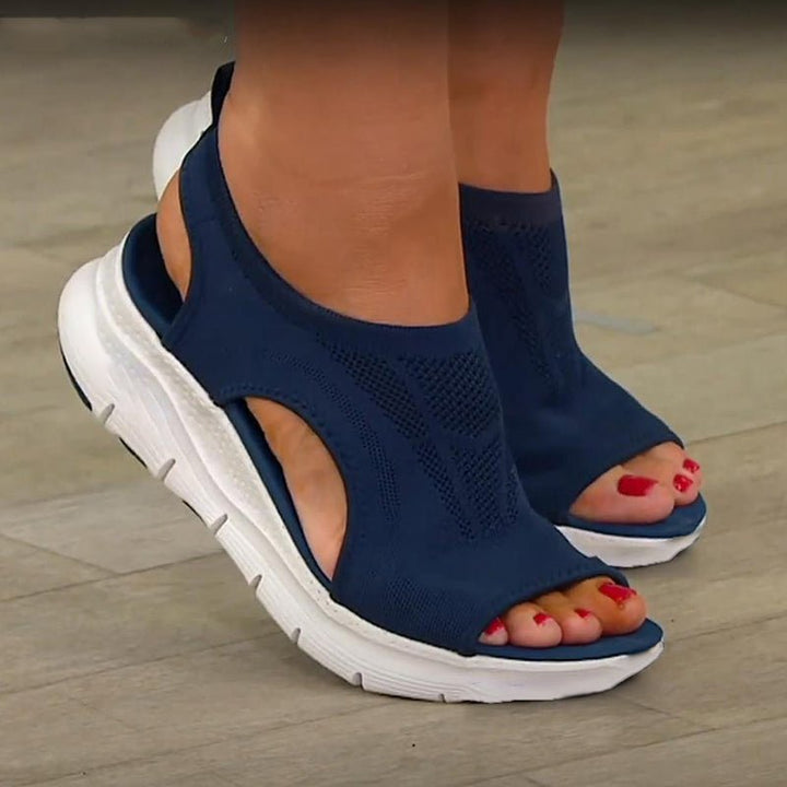 Pair of women's cushioned sport sandals, orthopedic design, ideal for summer casual wear.