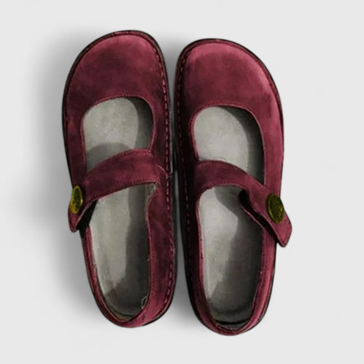 Close-up of women's orthopedic walking shoes highlighting arch support and comfort design.