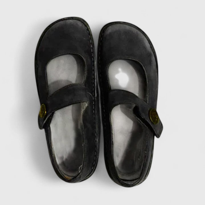 Pair of stylish women's orthopedic walking shoes, combining comfort, stability, and arch support.