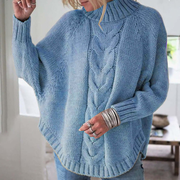 Women's oversized batwing sleeve jumper in a cozy knit for stylish, comfortable casual wear. Perfect for fall.