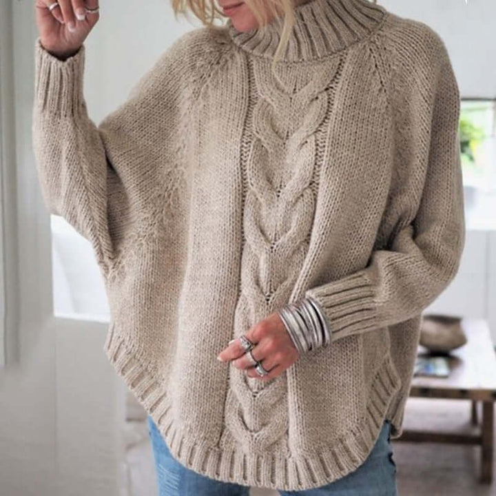 Stylish women's batwing sleeve jumper, a cozy knitwear essential with a relaxed fit for fall & winter comfort.