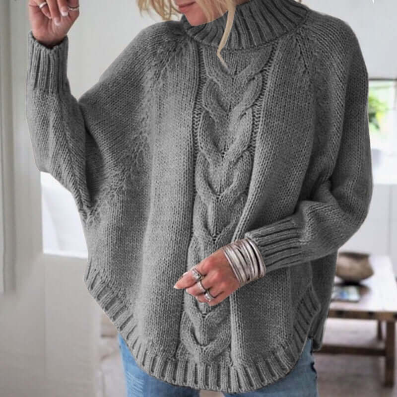 Oversized women's batwing sweater, a comfortable knitwear piece for casual wear, blending style and a relaxed fit.