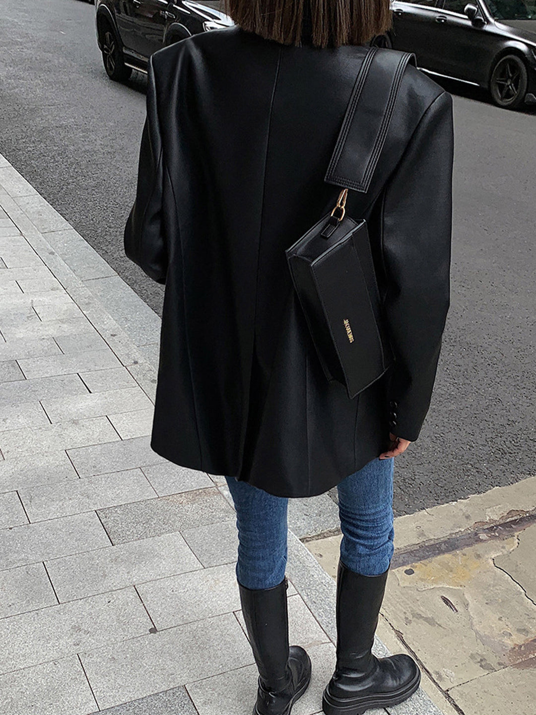 Chic brown oversized lapel blazer for women, a versatile statement jacket suitable for modern smart casual wear.