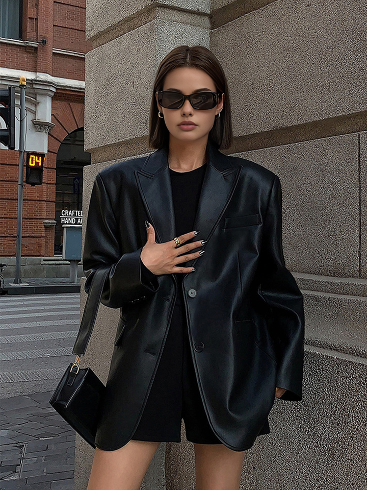 Fashionable women's oversized statement blazer with a chic lapel design, great for a bold and stylish look.