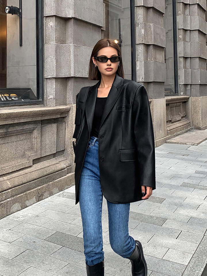 Versatile oversized women's lapel blazer, a chic outerwear jacket for winter fashion or smart casual styling.