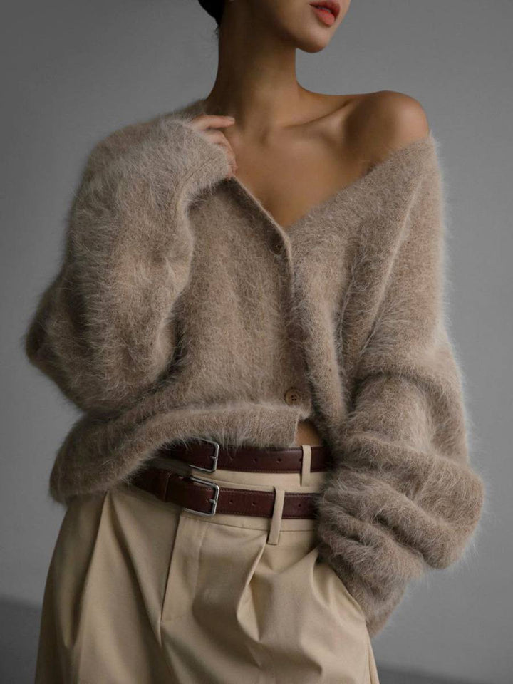 Women's oversized button-up cardigan, ideal for fall & winter layering. Cozy, relaxed fit for casual everyday style.