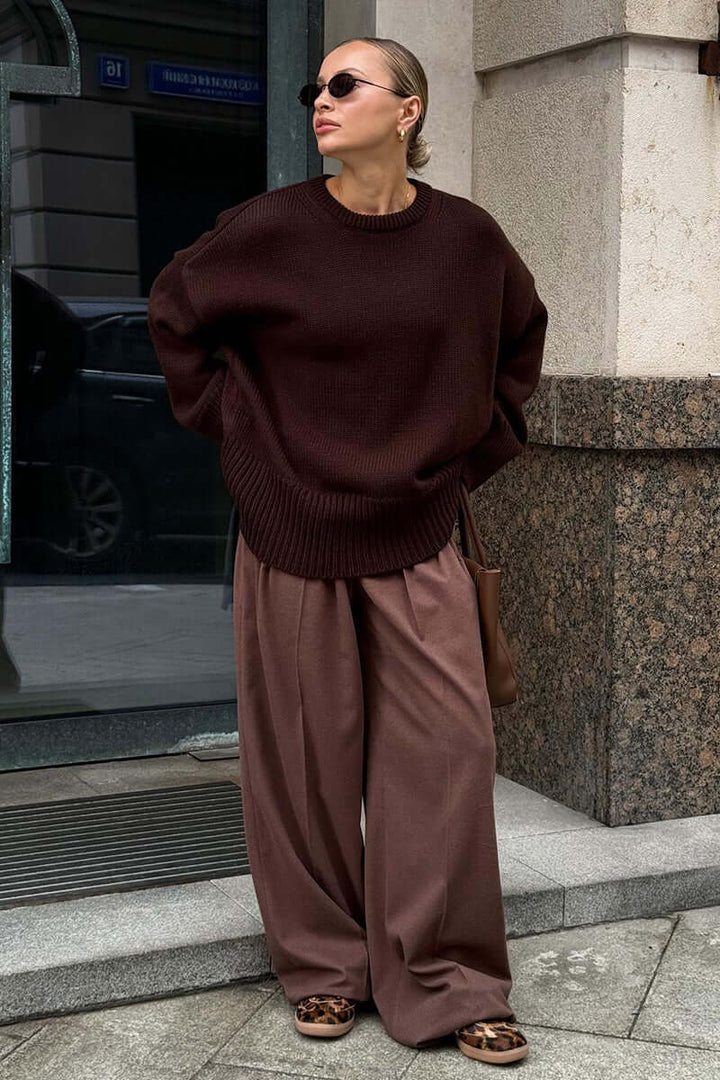 Women's oversized charcoal long-sleeve knit jumper, round neck comfort.