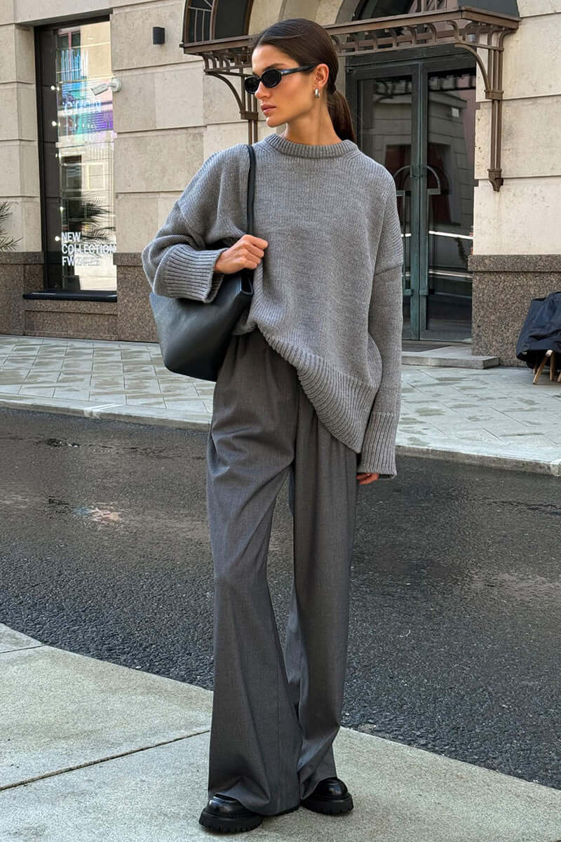 Soft women's charcoal sweater, oversized knit for relaxed winter style.