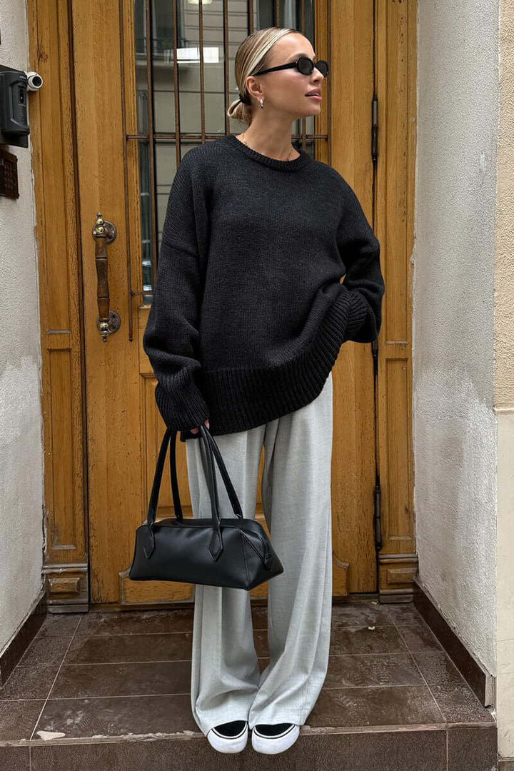 Relaxed fit women's charcoal knit sweater, ideal for autumn comfort.