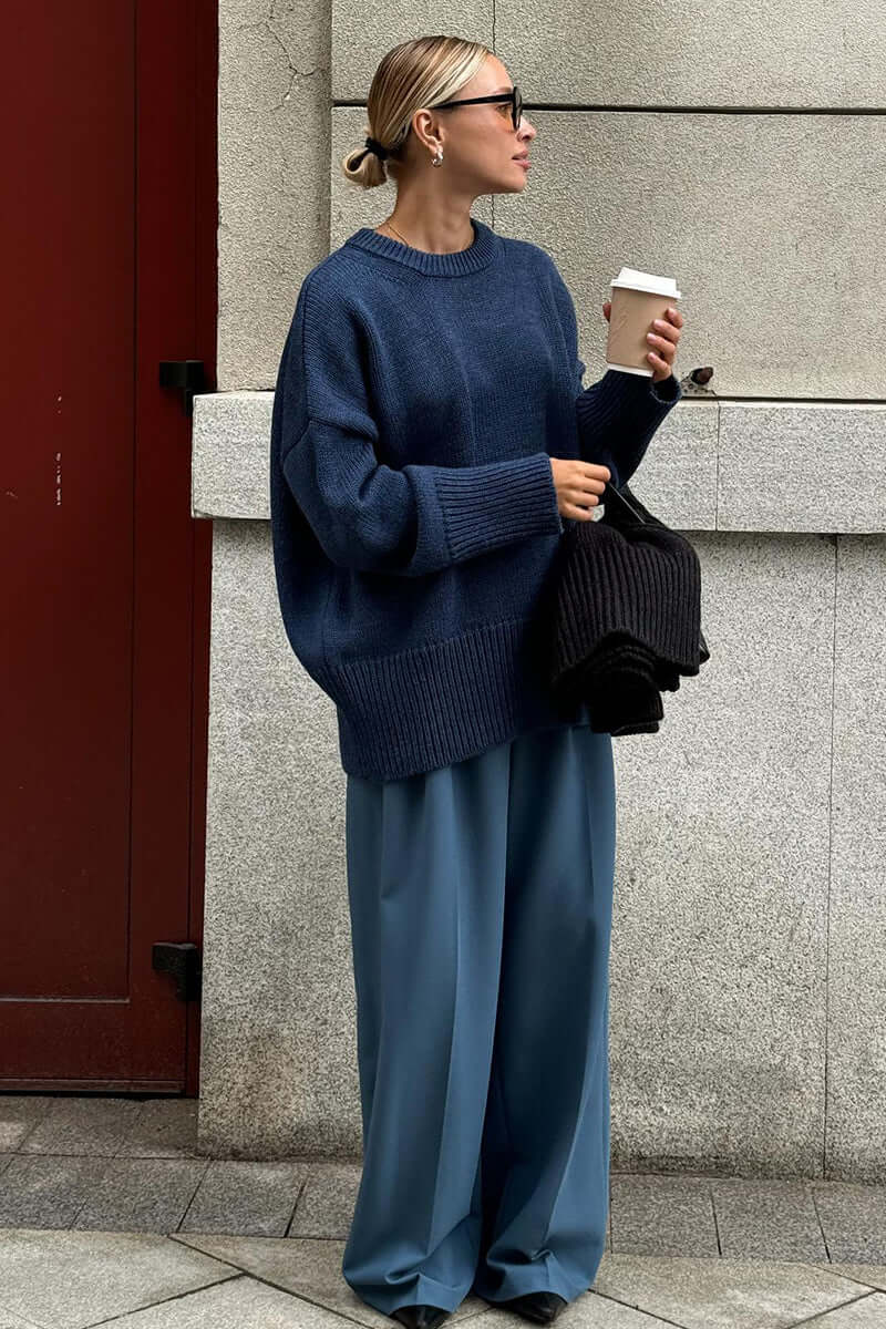 Women's charcoal knitted jumper, perfect for winter warmth & style.