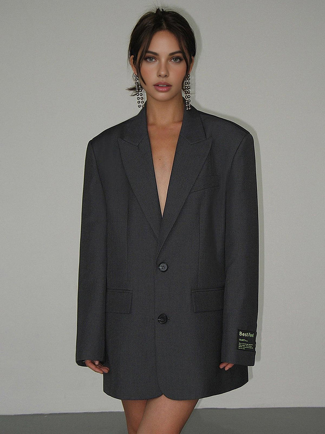 Fashionable women's oversized classic blazer coat, a tailored jacket that elevates any office wear or casual look.