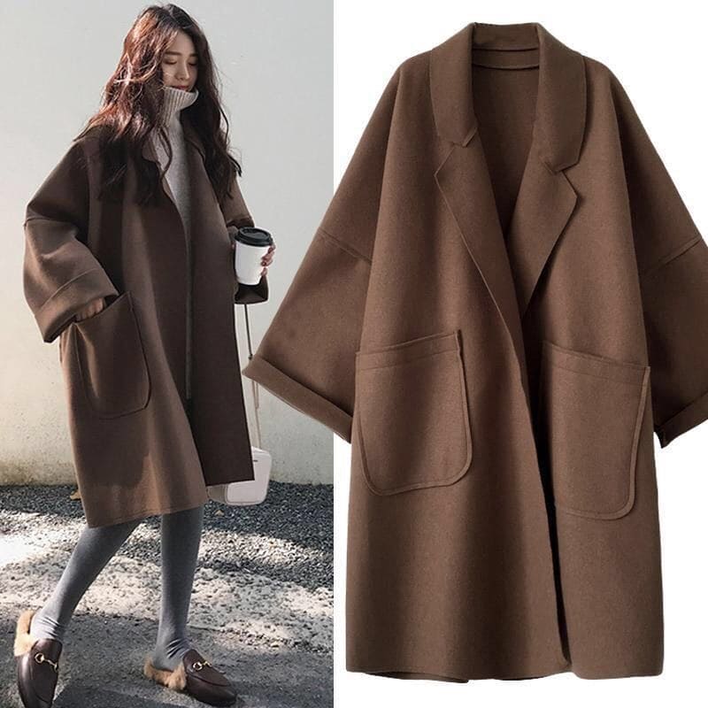 Women's oversized classic wool blend trench coat for elegant fall and winter fashion. Timeless style.