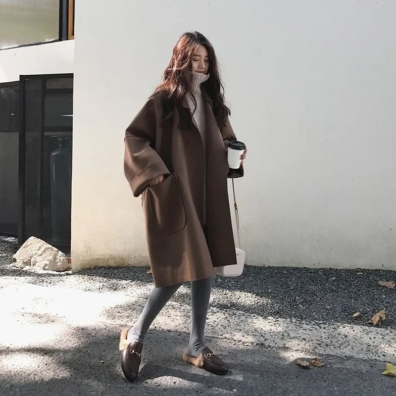 Double-breasted oversized Aura wool blend trench coat, perfect for timeless spring & fall outerwear. Classic.