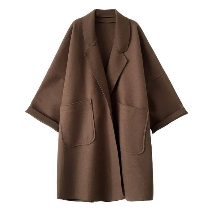 Luxurious wool blend oversized trench coat for women, a timeless classic suitable for elegant fall and winter.