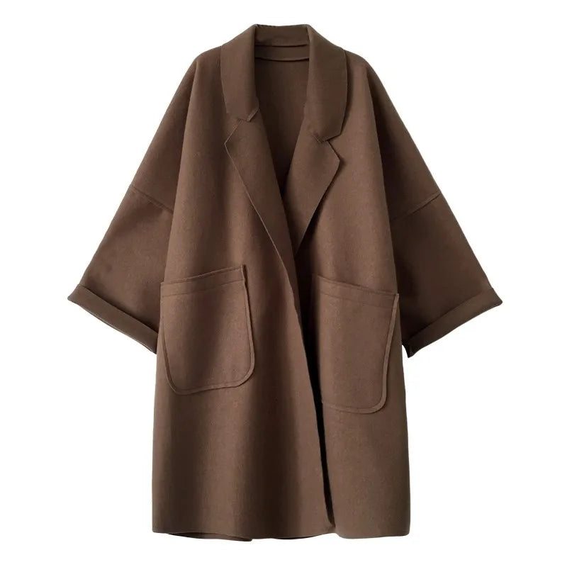 Comfortable oversized women's wool blend trench coat, classic and elegant for versatile styling in all seasons.