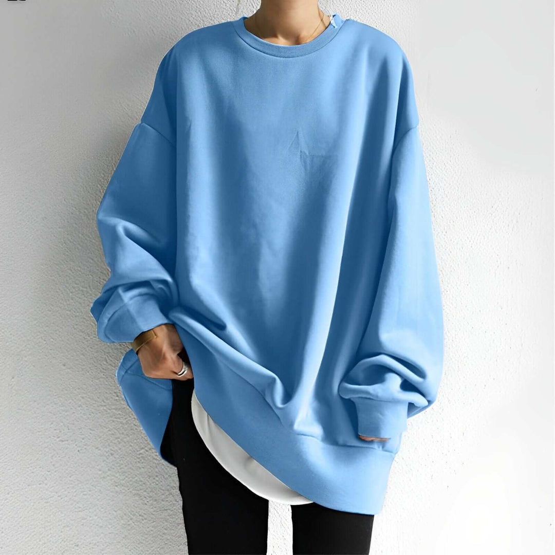 Soft women's oversized cotton pullover sweater, ideal for cozy loungewear and casual outfits.