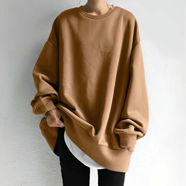 Fashionable women's oversized cotton sweatshirt, a versatile wardrobe essential for women.