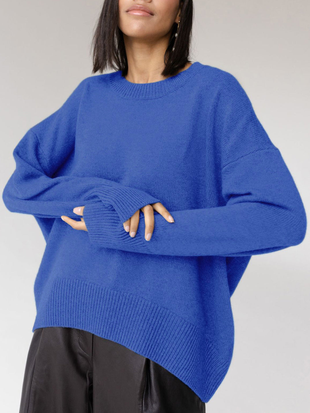 Cozy women's oversized crewneck sweater, a fashion essential providing warmth & chic style for cool weather.