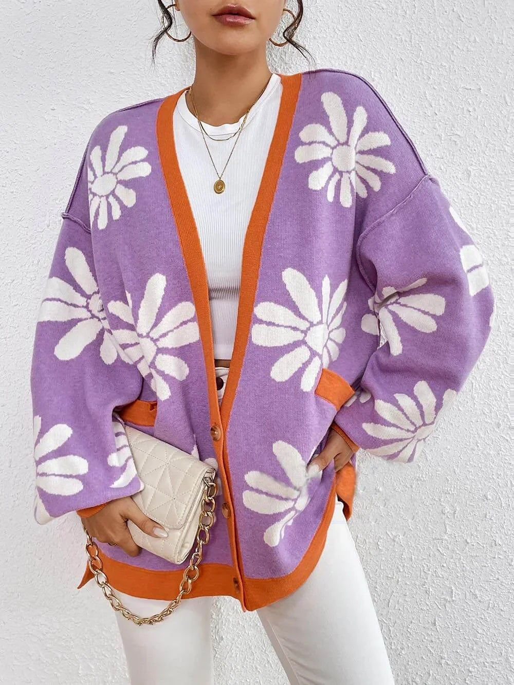 Women's oversized floral cardigan, perfect for casual layering. Comfortable and relaxed fit for all seasons.