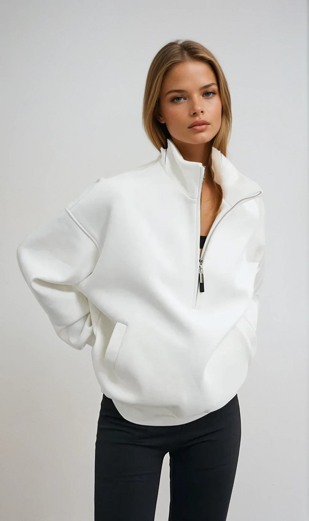Women's oversized half-zip pullover hoodie in a cozy relaxed fit, perfect for casual loungewear.