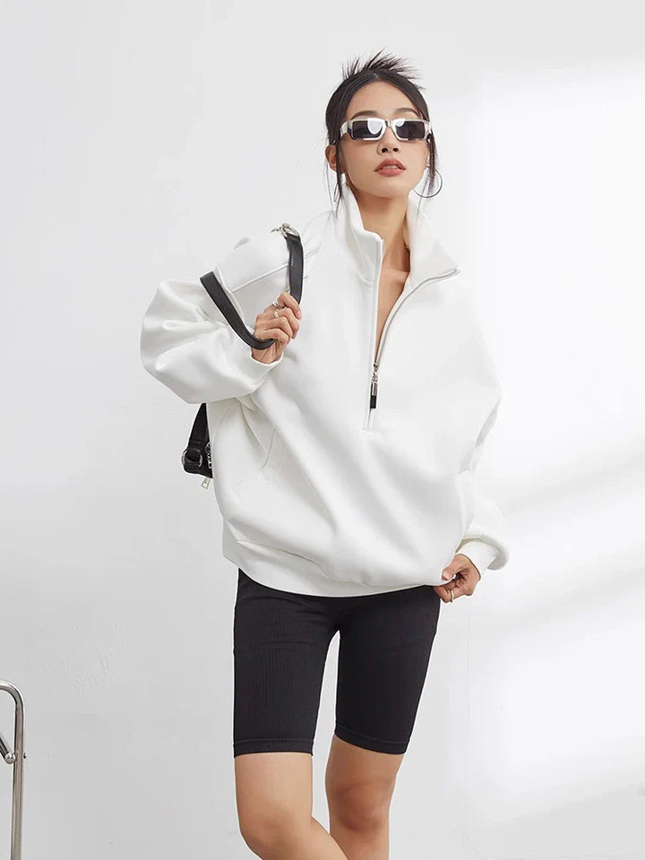 Women's cozy oversized half-zip pullover hoodie, a relaxed fit sweater perfect for loungewear & casual style.