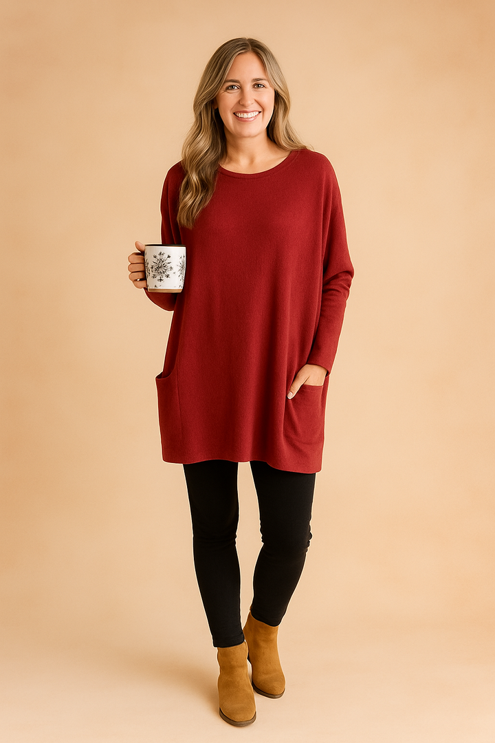 Cozy & stylish women's oversized fall sweater with long sleeves & pockets for ultimate comfort.