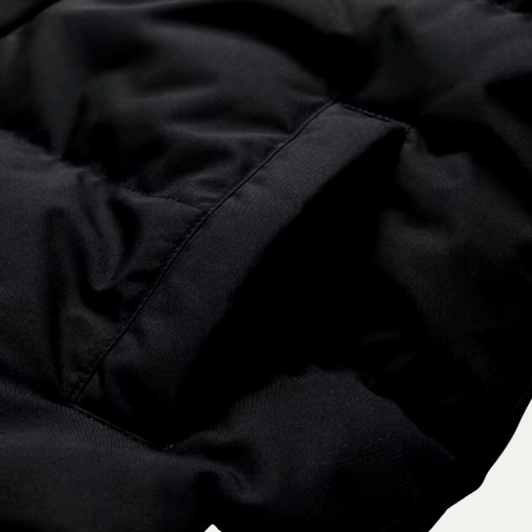 Ultimate winter warmth in this women's oversized hooded puffer jacket, a modern cold weather coat.