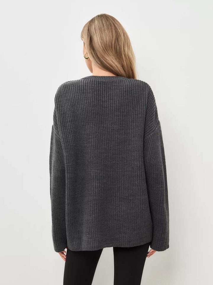Relaxed fit women's soft knit pullover, oversized, cozy, essential for winter fashion style.