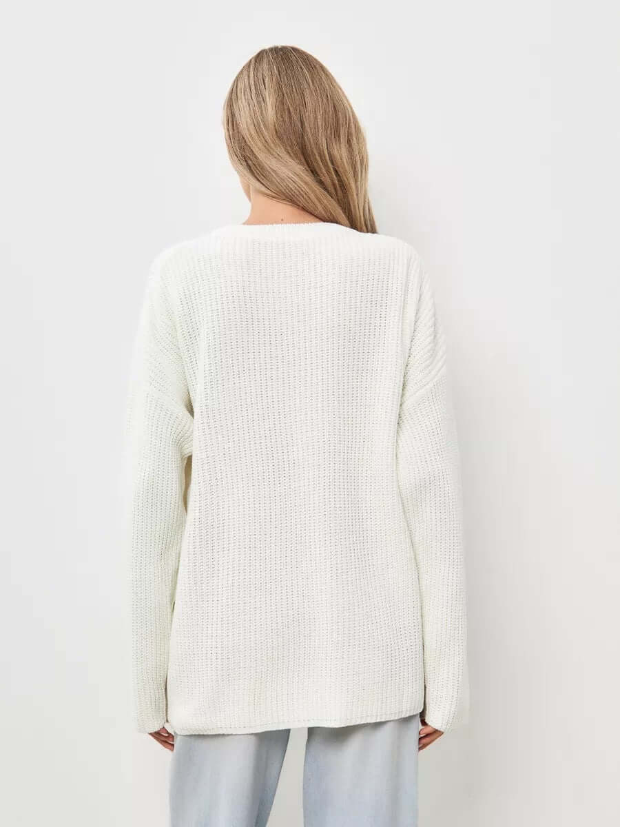 Stylish women's oversized knit jumper, soft, relaxed fit, perfect for casual winter warmth.
