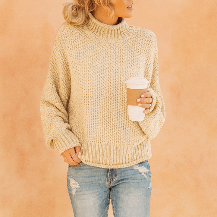 Relaxed fit women's oversized turtleneck sweater, warm & cozy for chilly fall & winter days.