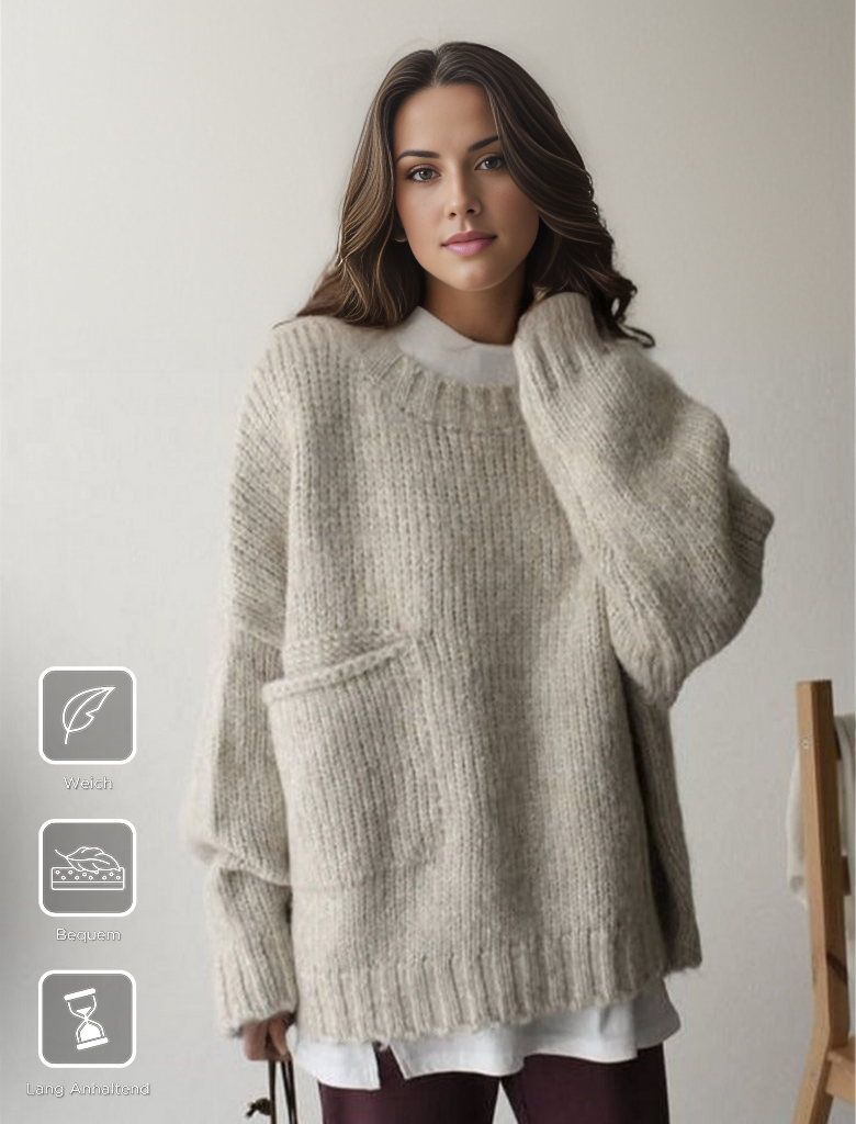 Women's oversized knitted jumper, cozy & effortlessly stylish for fall fashion.