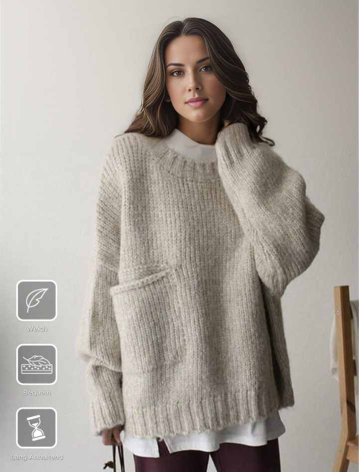 Women's oversized knitted jumper, cozy & effortlessly stylish for fall fashion.
