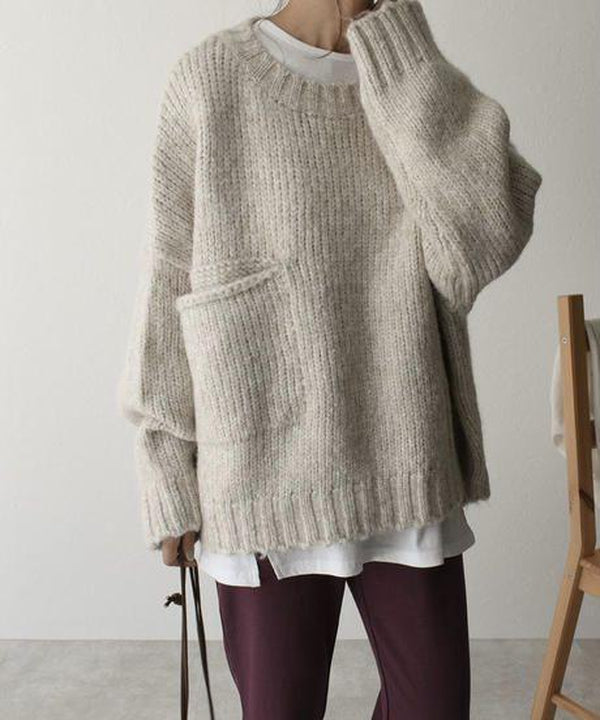 Stylish oversized cream knit sweater, ideal for casual comfort & everyday wear.