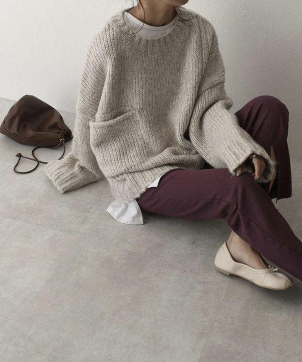 Effortlessly stylish women's loose knit sweater, perfect for fall fashion outfits.