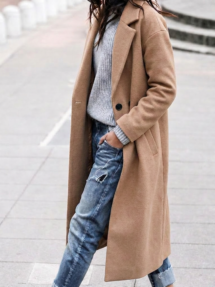 Women's oversized long trench coat with stylish lapel, perfect for chic fall fashion & versatile outerwear.