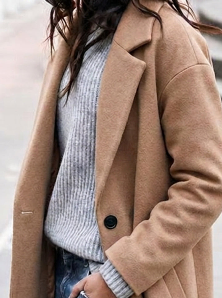 Long oversized trench coat for women, elegant lapel detail, ideal for fall & winter outerwear.