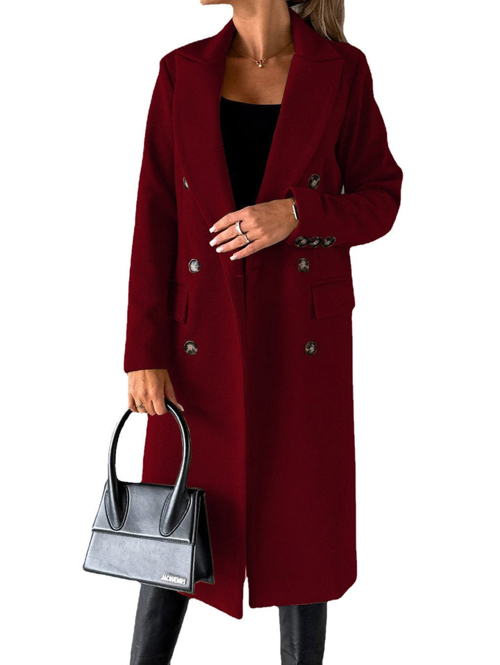Stylish women's oversize long winter jacket for urban style, warmth, and modern minimalist everyday comfort.