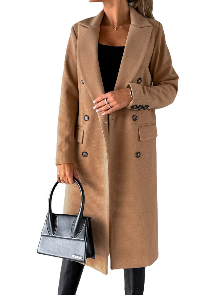 Women's urban style oversize long jacket. A chic winter coat for modern minimalist fashion and daily comfort.